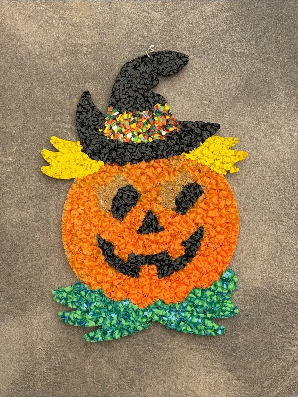 VTG melted plastic popcorn decoration features a jack-o'-lantern wearing a hat